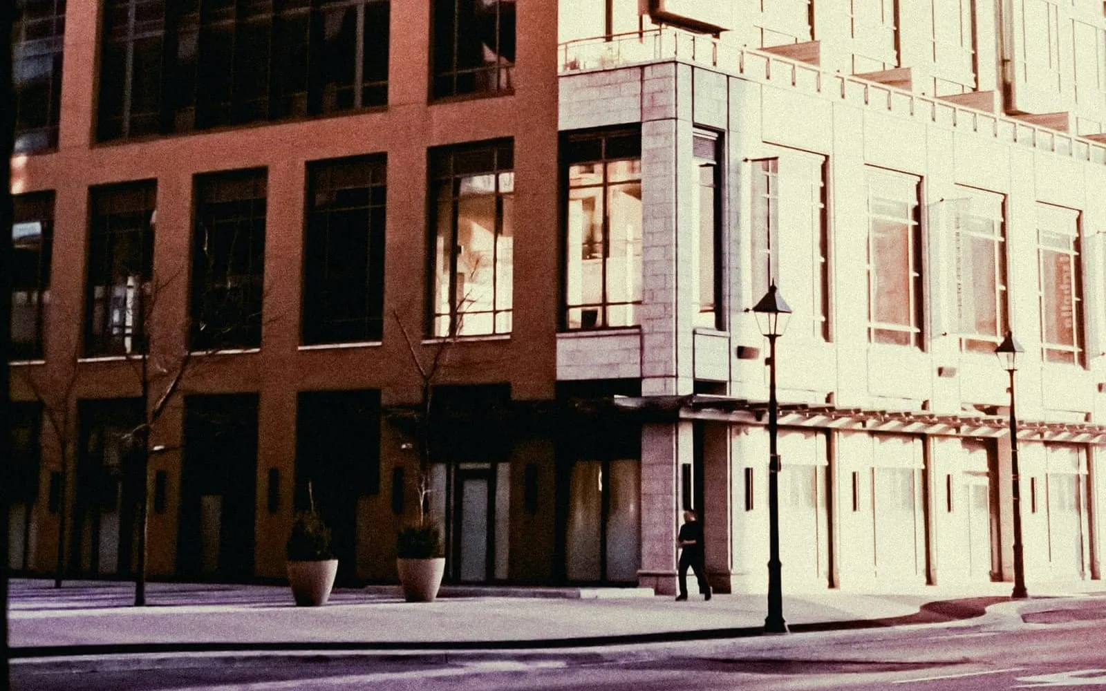 Modern commercial building with a glass and brick facade